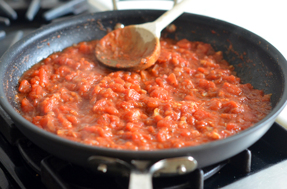 Skillet of thickened tomato sauce.