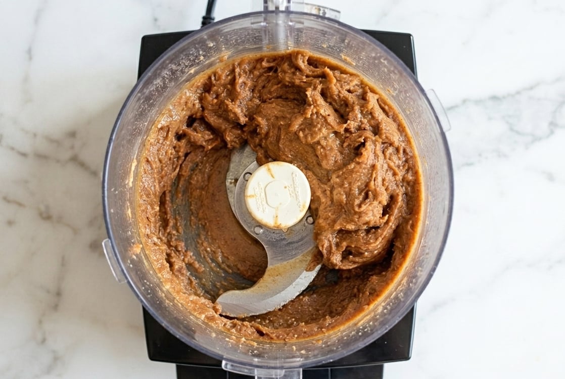 Date mixture in food processor for blueberry granola bars.