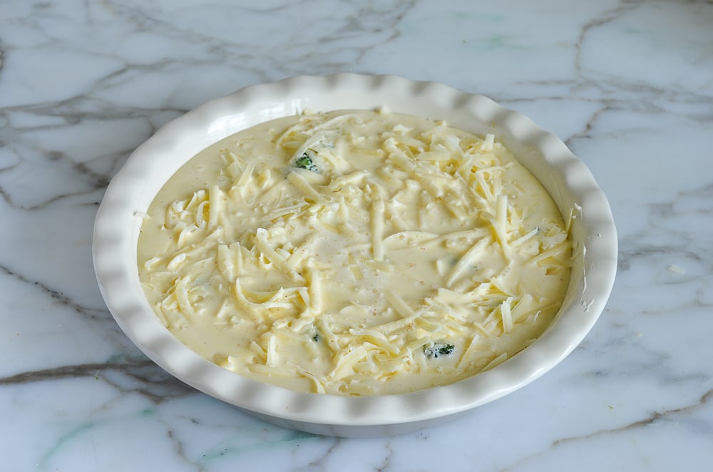 Egg mixture in a pie pan.