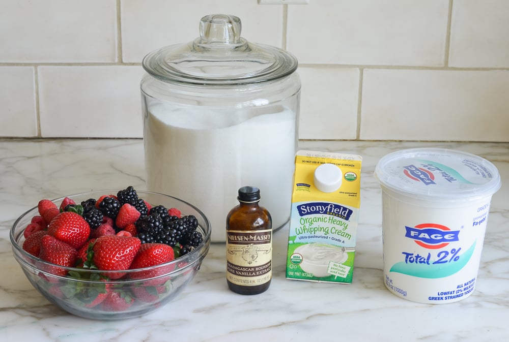 Ingredients including berries, heavy cream, and vanilla.