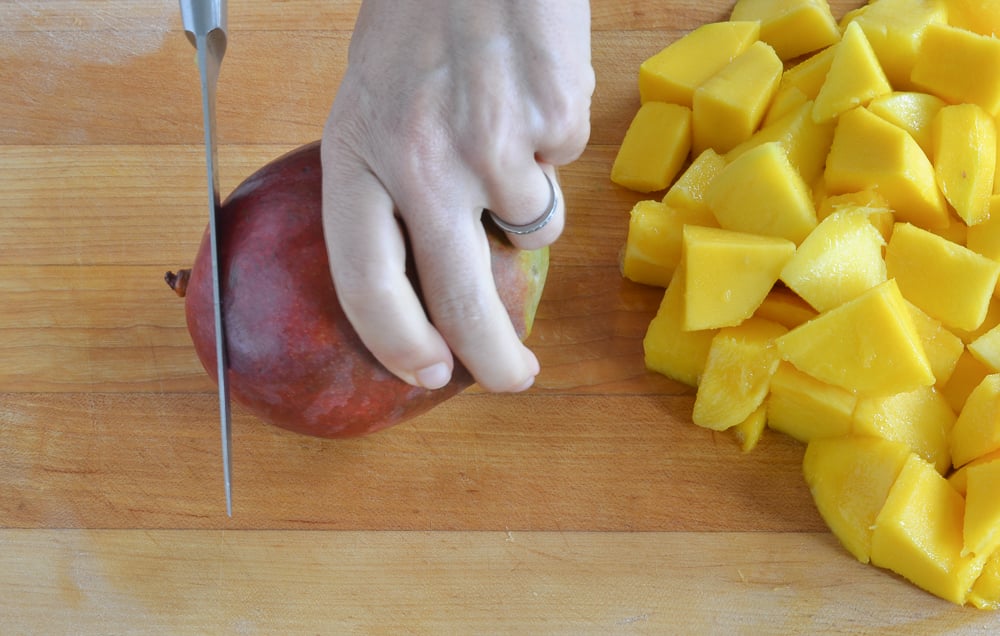 cutting end off mango