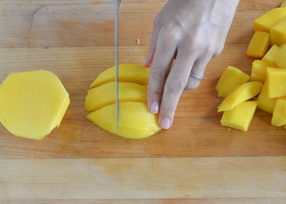 cutting flesh into chunks