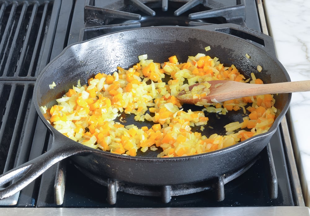 softened onions, garlic and peppers in skillet