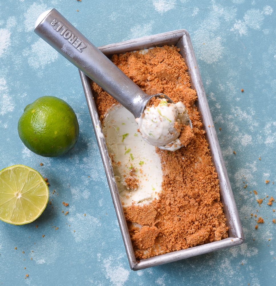 scooping frozen ice cream from loaf pan