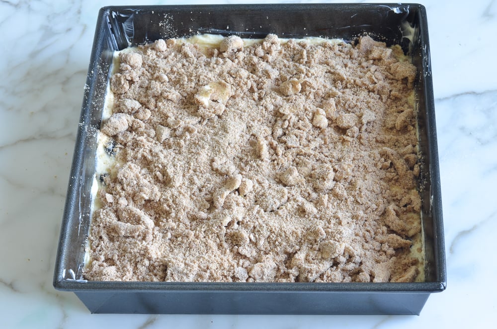 Coffee cake batter topped with streusel topping.