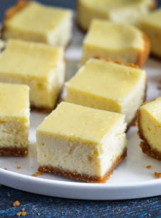 Plate of cheesecake bars.