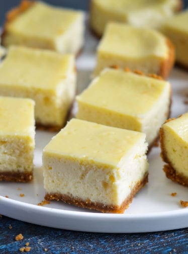 Plate of cheesecake bars.