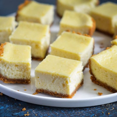 Plate of cheesecake bars.