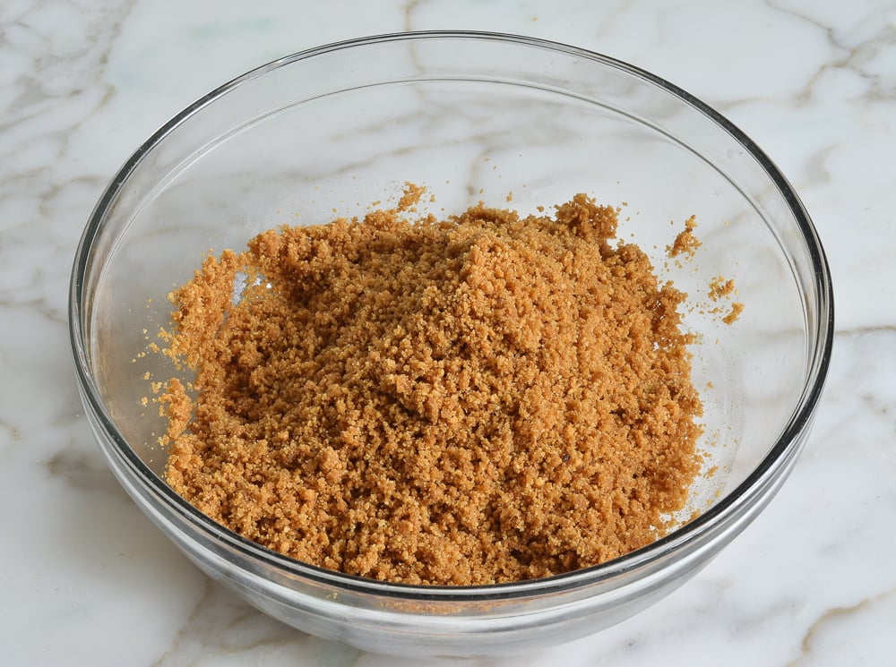 Graham cracker mixture in a bowl.