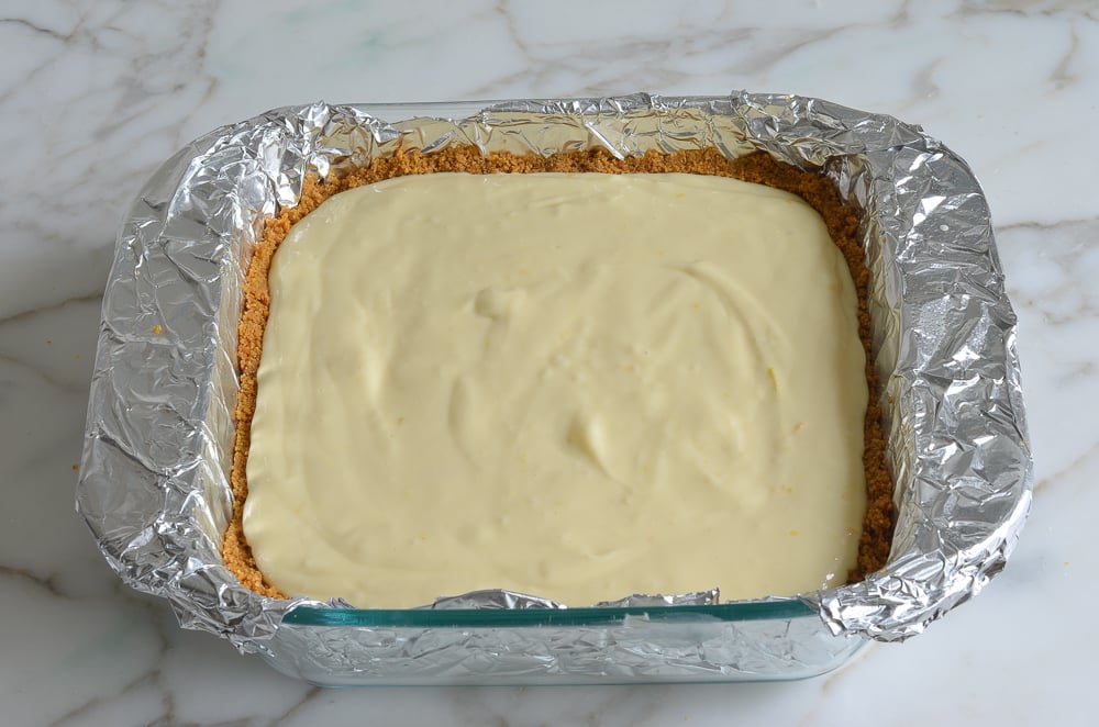 Graham cracker crust filled with cream cheese mixture.