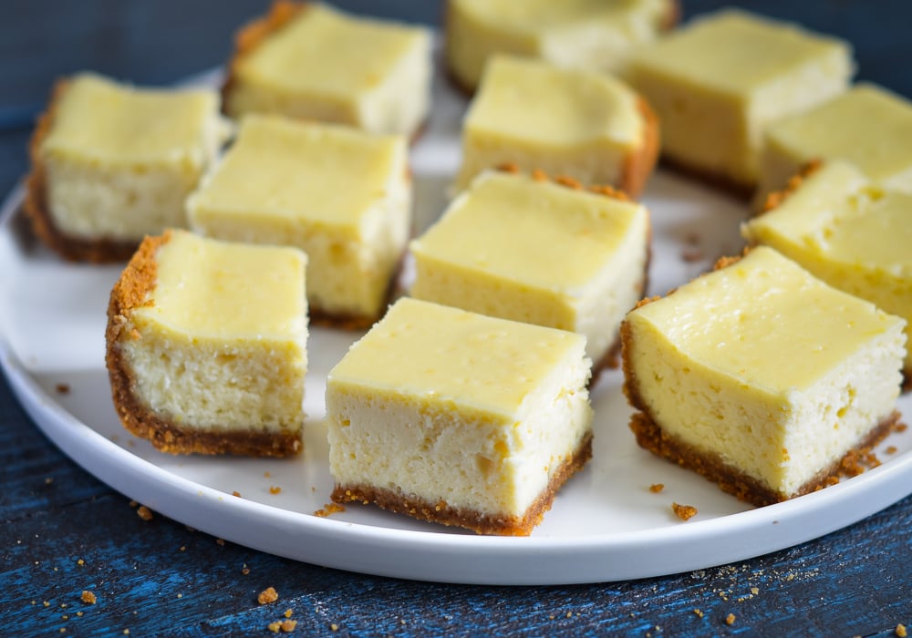 Plate of cheesecake bars.