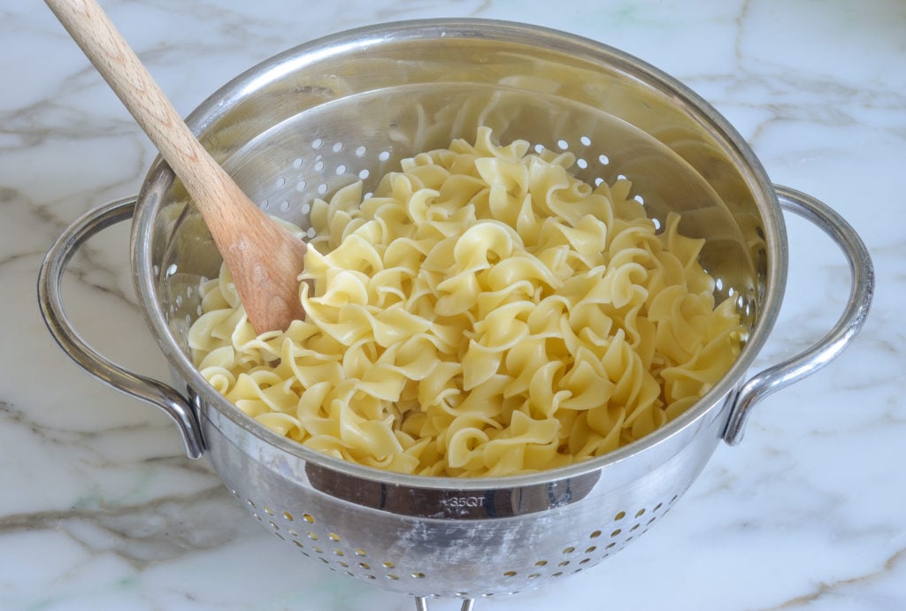 Noodles in a colander.