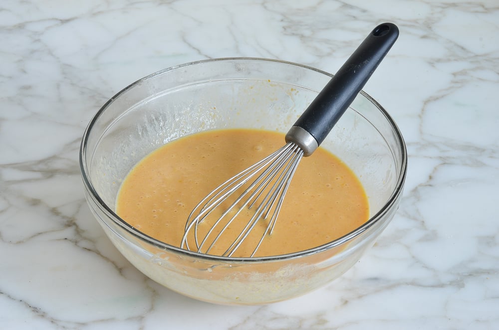 wet ingredients in a mixing bowl for pumpkin pancakes