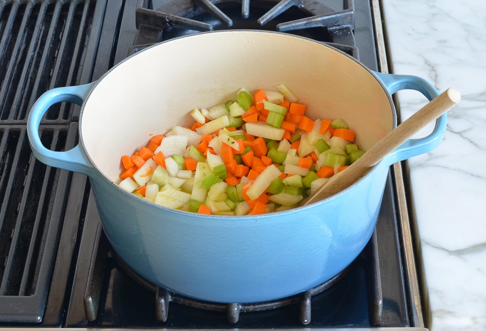 Vegetables in a Dutch oven.