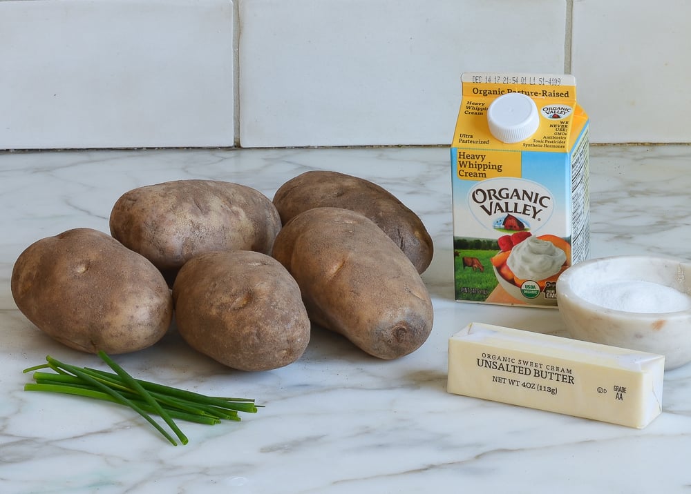 Ingredients including potatoes, butter, and heavy whipping cream.