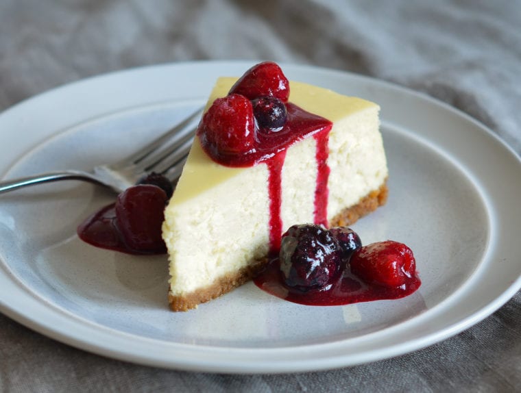 Slice of Cheesecake on a plate.