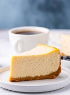 Slice of cheesecake on a plate.