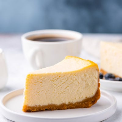Slice of cheesecake on a plate.