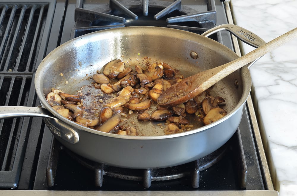 Skillet of cooked mushrooms.