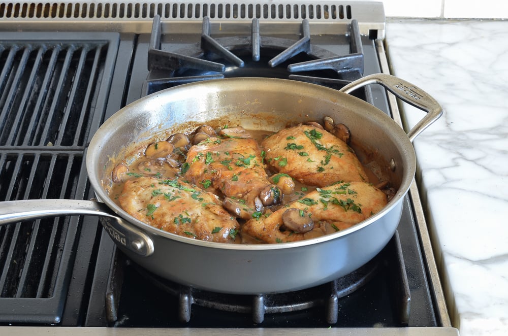Skillet of chicken marsala.