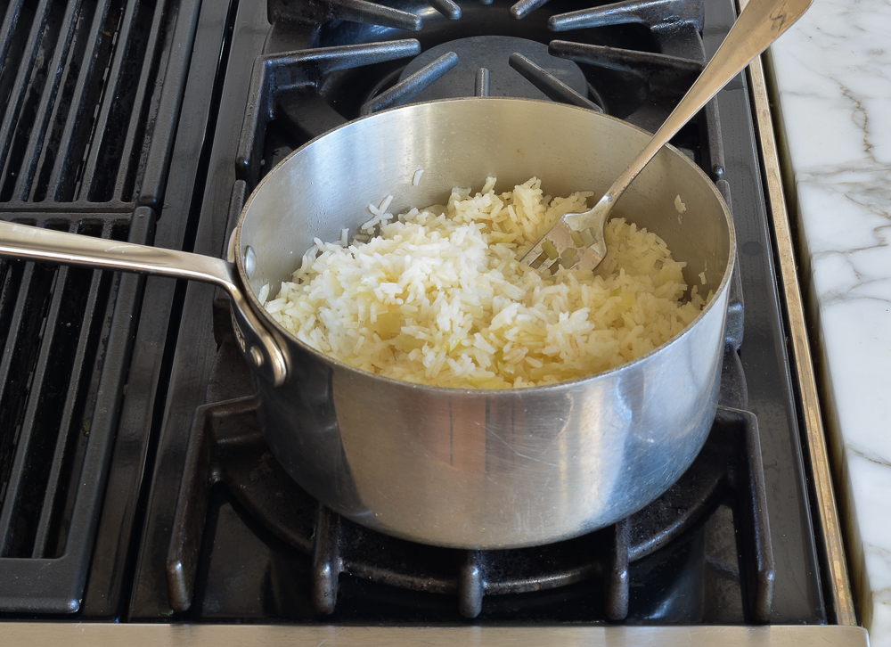 Fork in a sauce pan of rice.