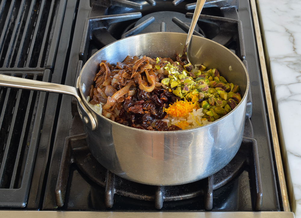 Unmixed pilaf ingredients in a sauce pan.