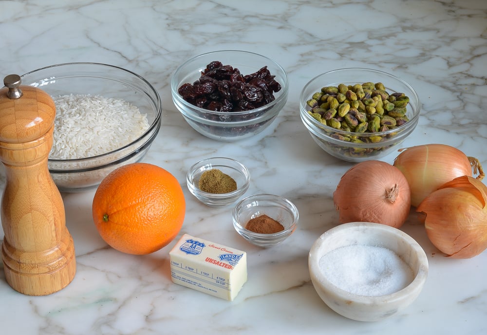 Pilaf ingredients including onion, orange, and butter.