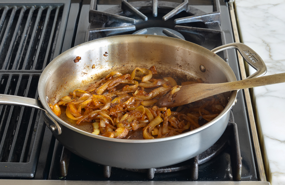 Skillet of seasoned onions.