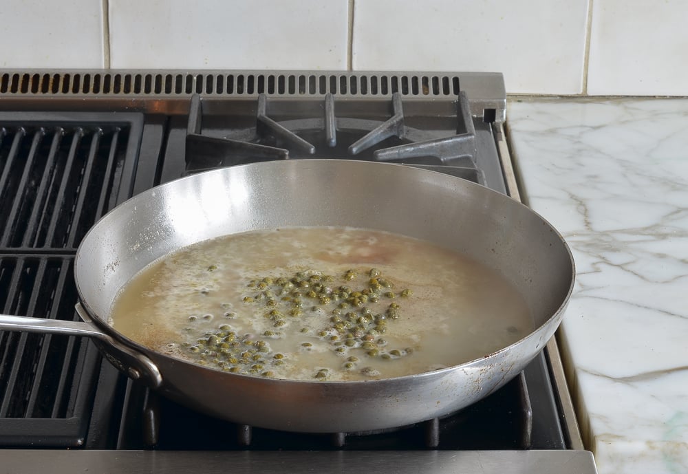 making chicken piccata sauce.
