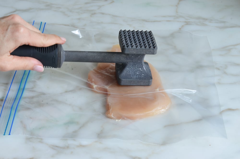 pounding the chicken breasts 