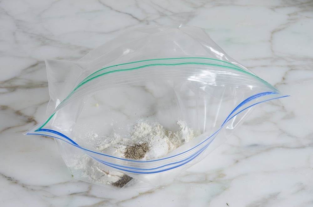 flour and seasonings in plastic bag