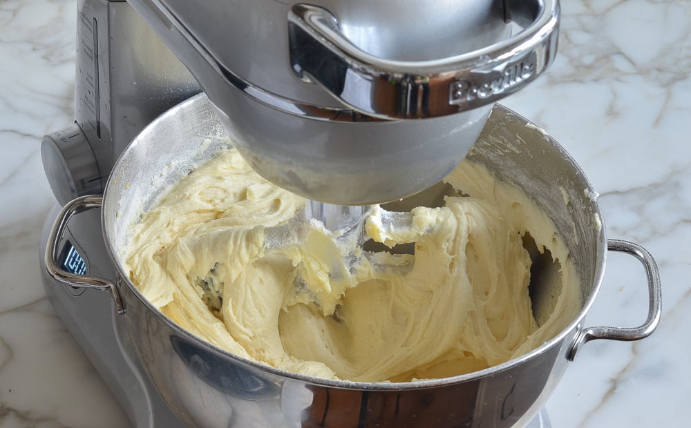Stand mixer of smooth sour cream coffee cake batter.