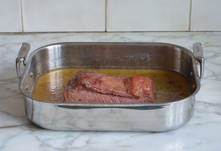 making corned beef and cabbage - roasted corned beef fresh out of the oven