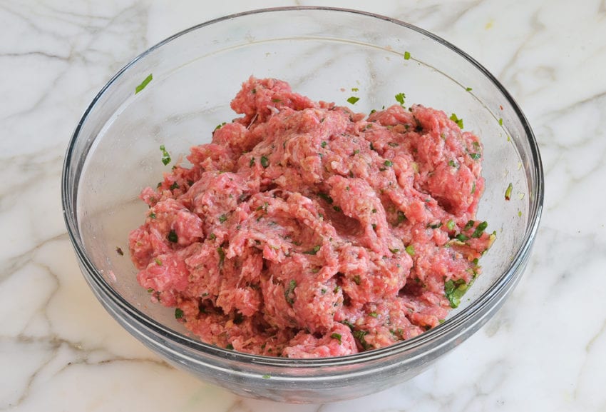 Meat and panko mixture in a bowl.