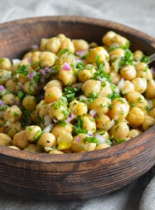 Wooden bowl of Chickpea Salad.