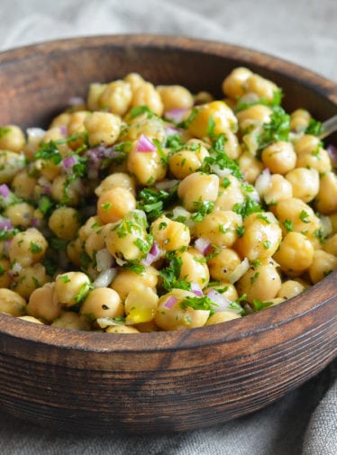 Wooden bowl of Chickpea Salad.