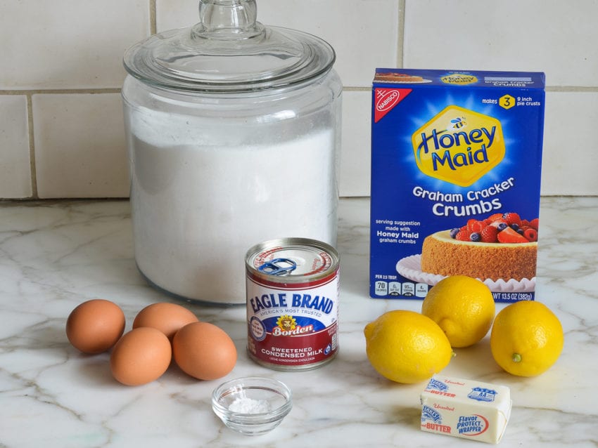 Pie ingredients including graham cracker crumbs, eggs, and condensed milk.