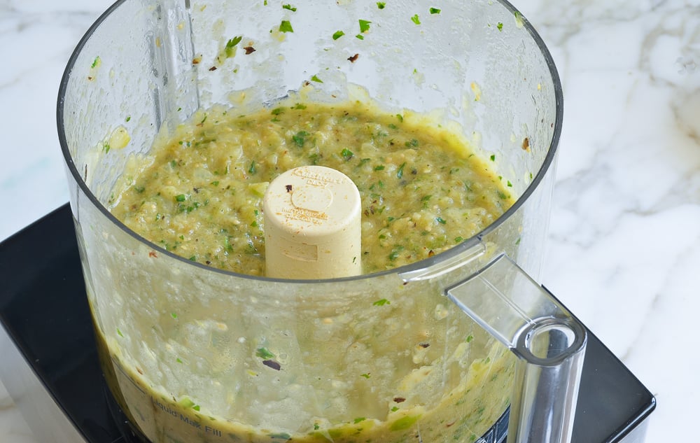 Salsa verde in a food processor.