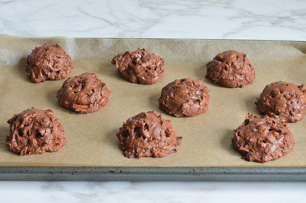 Lined baking sheet of blobbs.