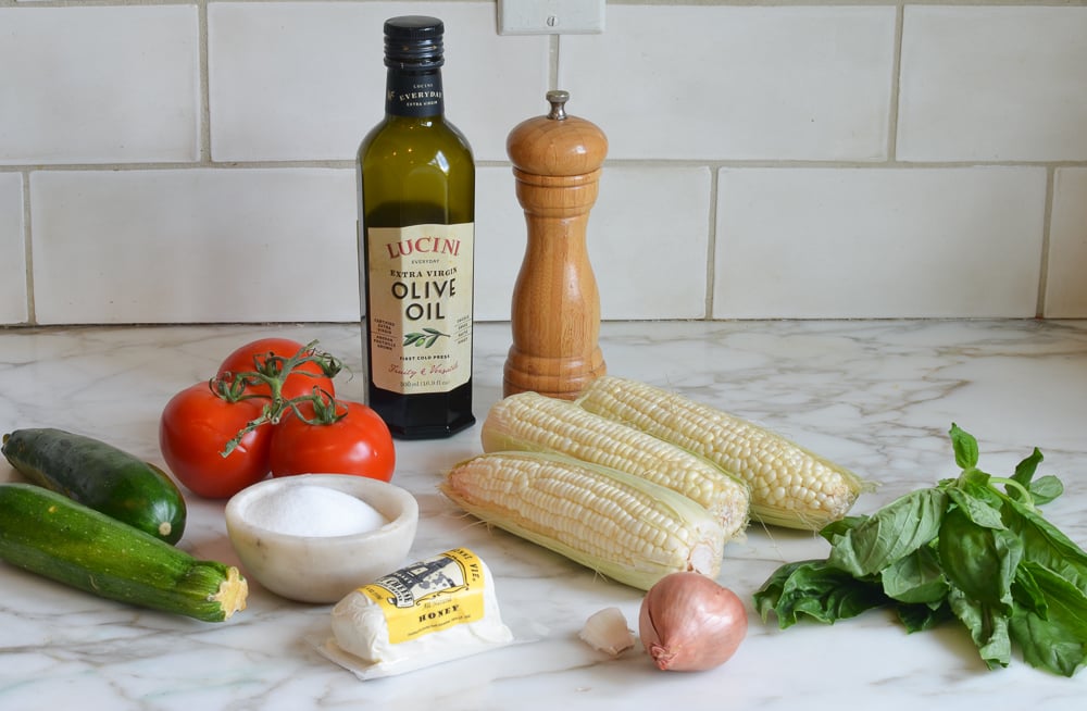 Ingredients including onion, olive oil, and goat cheese.