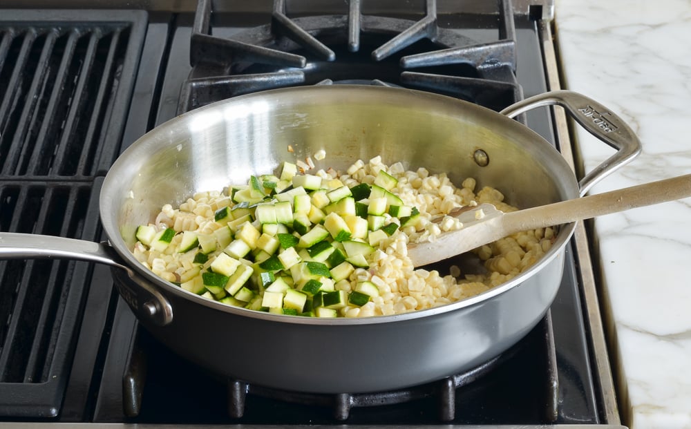 Skillet with zucchini and corn.