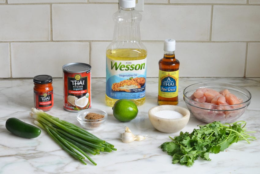 Curry ingredients including coconut milk, fish sauce, and lime.