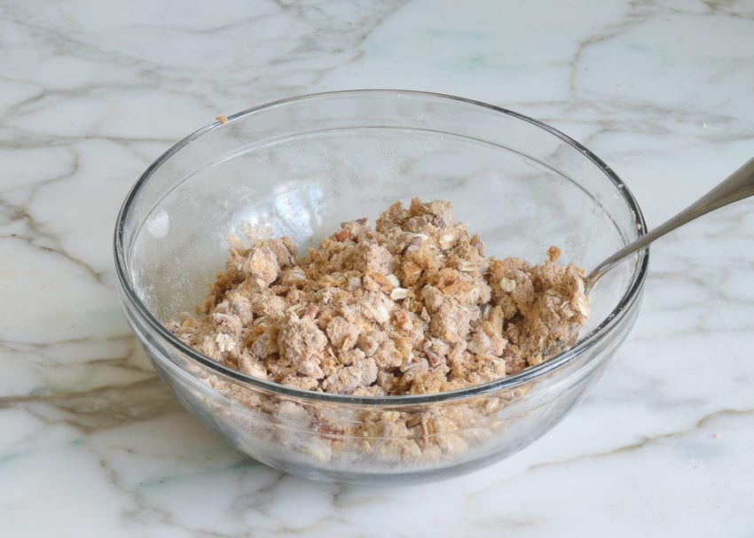 Bowl of crumbly nut and butter mixture.