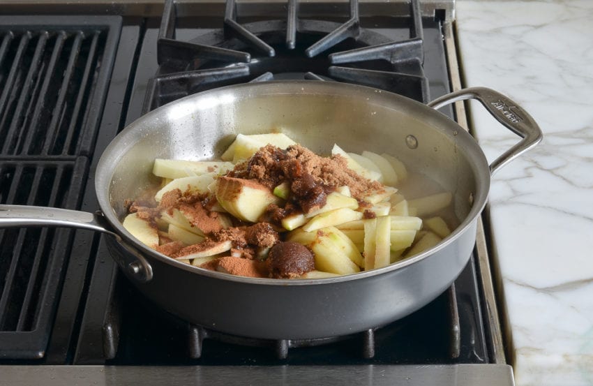 Skillet of apples and flavorings.