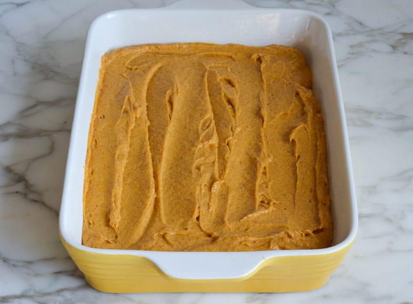 Baking pan of pumpkin cake batter.