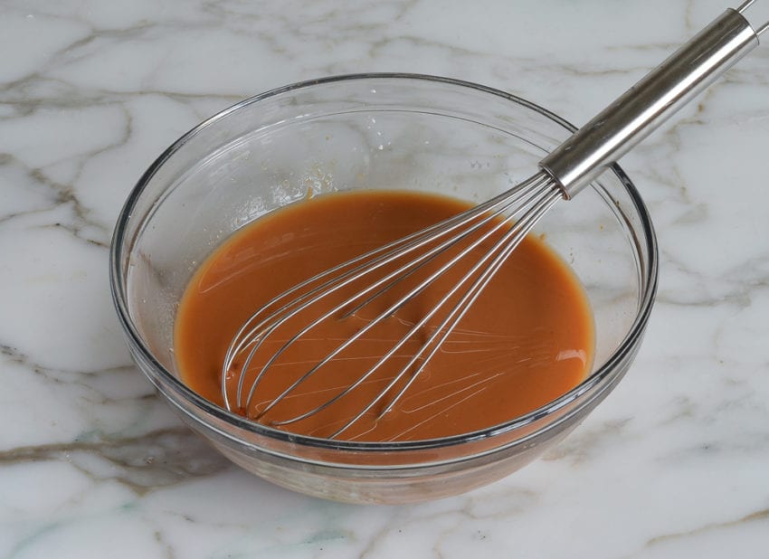 Whisk in a bowl of sweet and sour sauce.