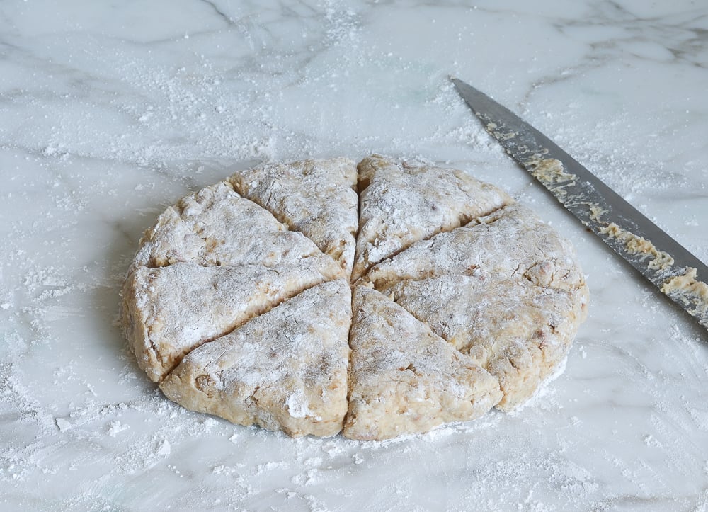 Dough cut into eight triangles.