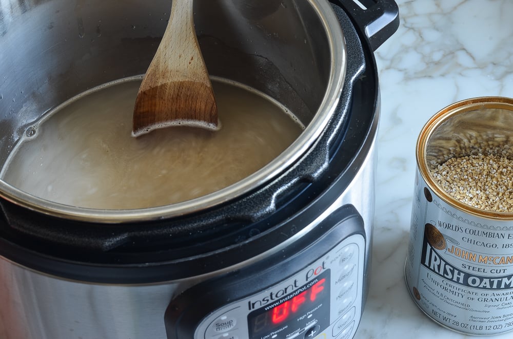 Steel-cut oats, water, and salt in an Instant Pot.
