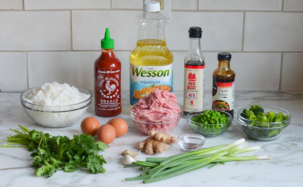 Fried rice ingredients including peas, ginger, and sriracha.