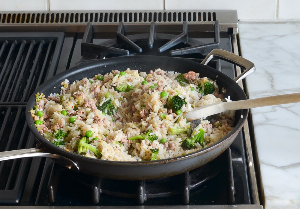 Rice mixture in a skillet.